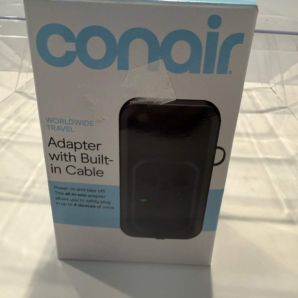 Conair Black Worldwide Travel Adapter with Built-in Cable